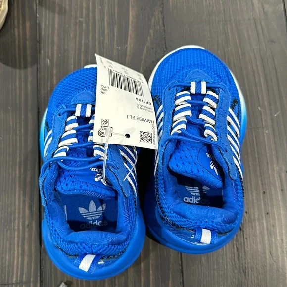 Toddler size 4 shoes. Sperry and Adidas. Adidas are nwt.selling separately.